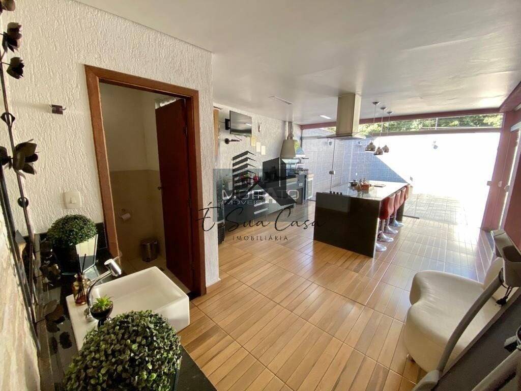 Casa à venda com 4 quartos, 240m² - Foto 7