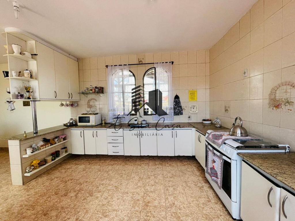 Casa à venda com 4 quartos, 331m² - Foto 35